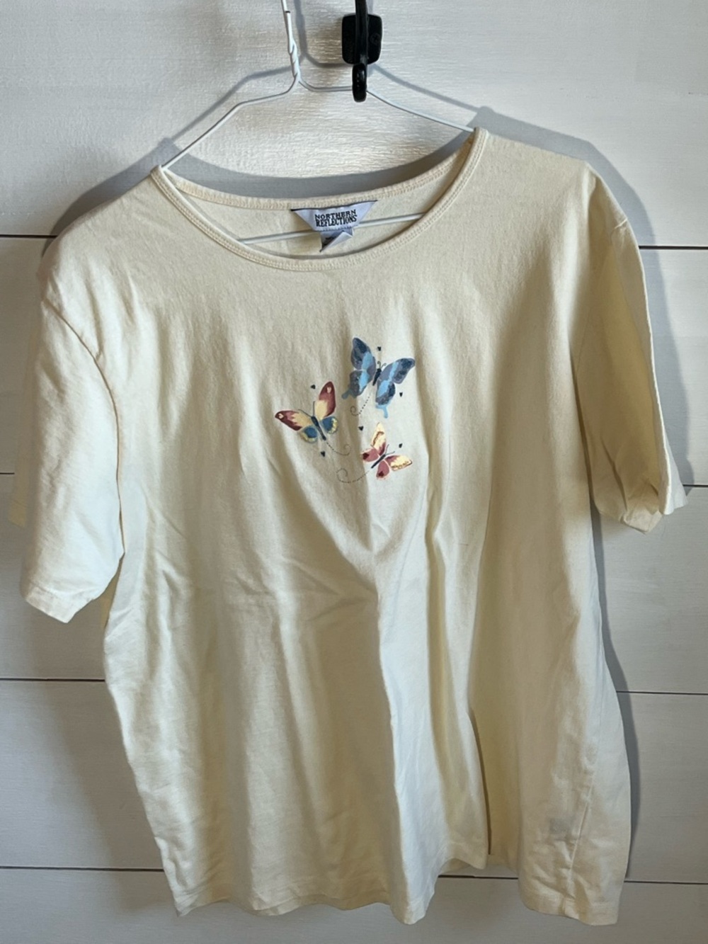Northern Reflections Cream Tee with Multicolor Butterfly Motif